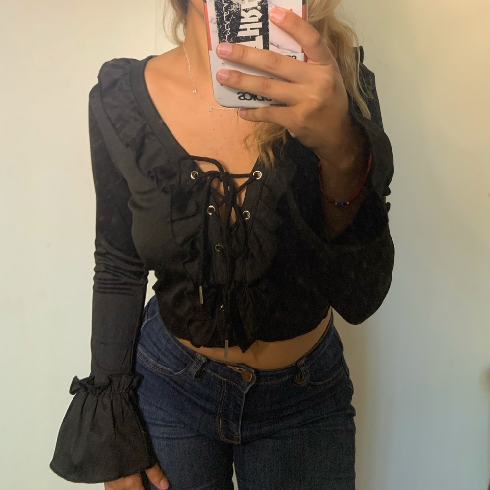 black long sleeve crop top, ties down the middle